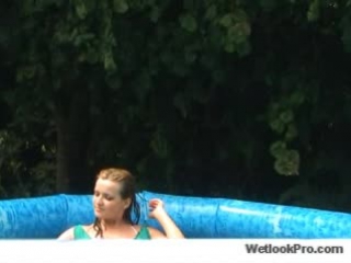 blonde wearing green in pool and playing in slide part 2